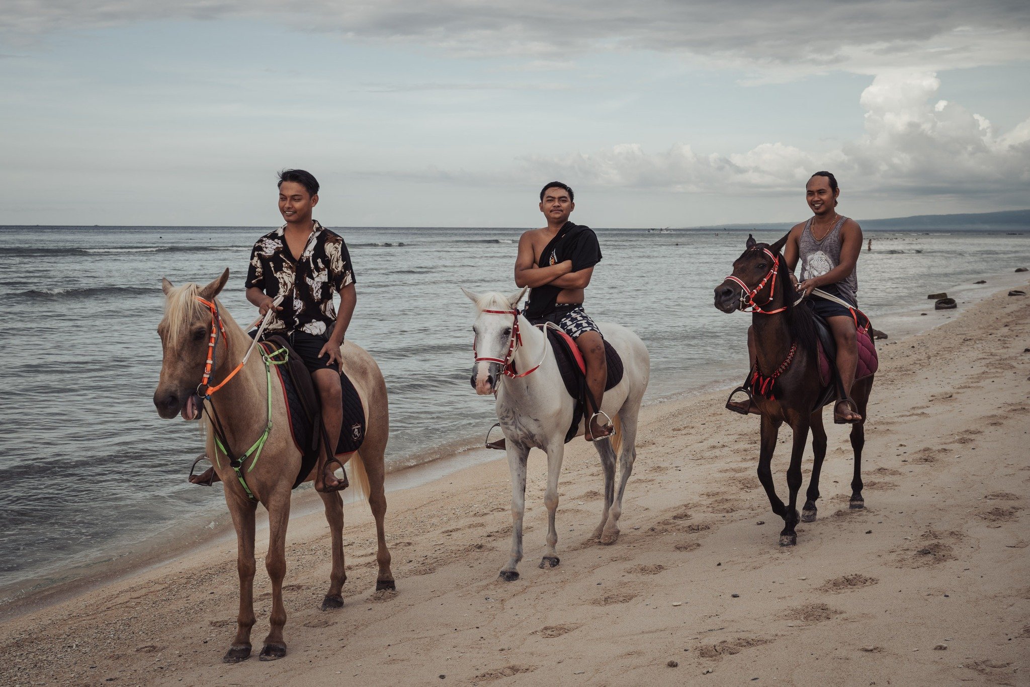 Gili Trawangan, a small island off the northwest coast of Lombok, Indonesia, is known for its unique transportation system and horse culture. One evening, after spending the day exploring the island on a bicycle, the second mode of transport on the i