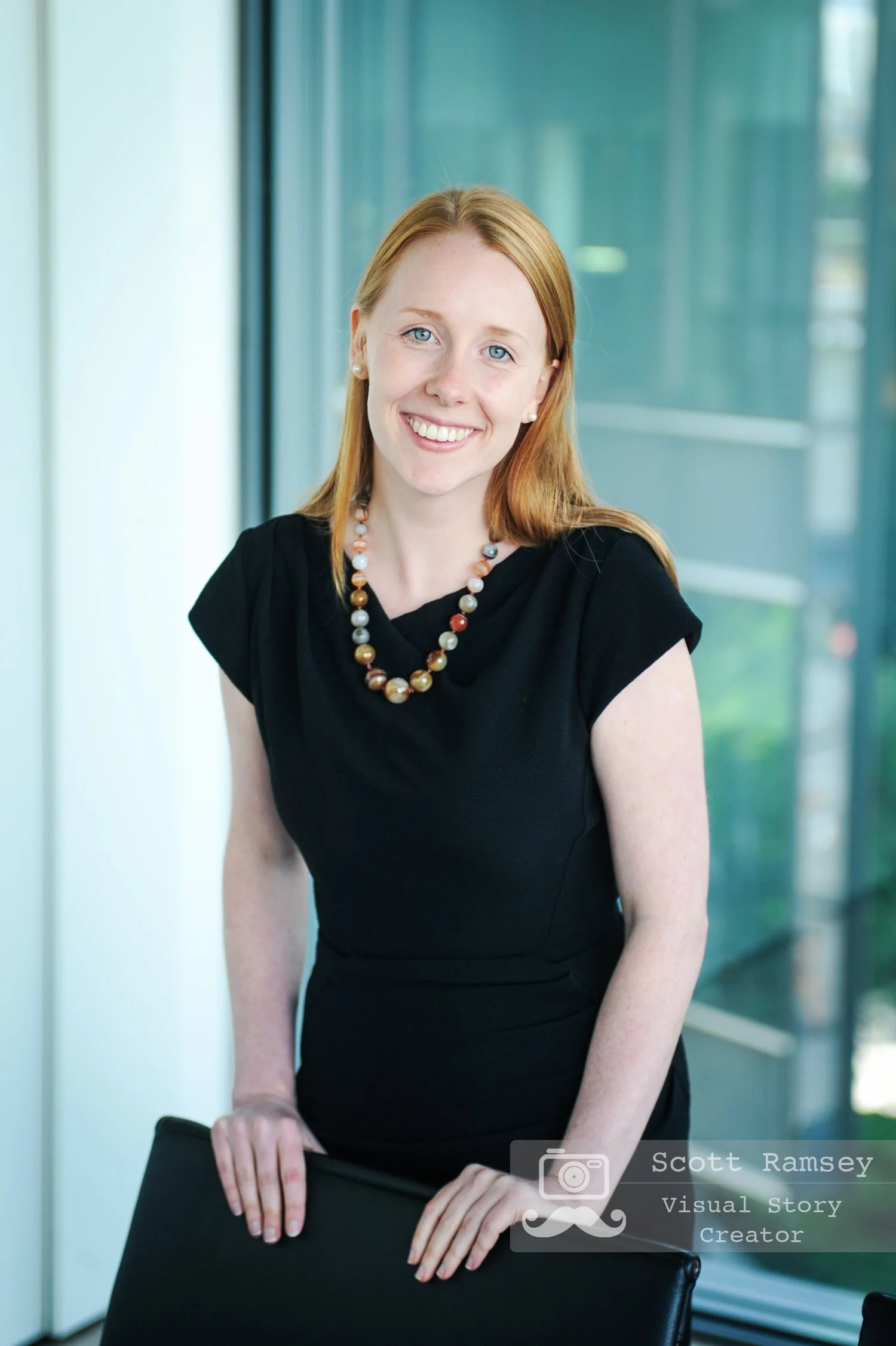 A professional video production setup for a documentary-style CEO interview, featuring high-end cinema cameras and lighting in a corporate environment.