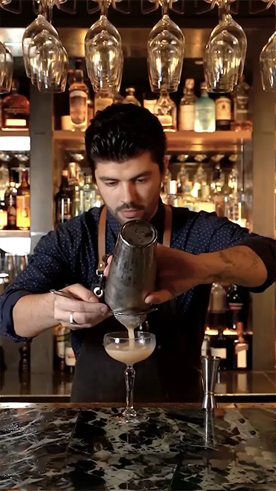 Cinematic close-up of a premium cocktail at Coal Shed London, shot by a social media videographer to demonstrate high-end, 4K vertical content for the hospitality and luxury retail sectors.