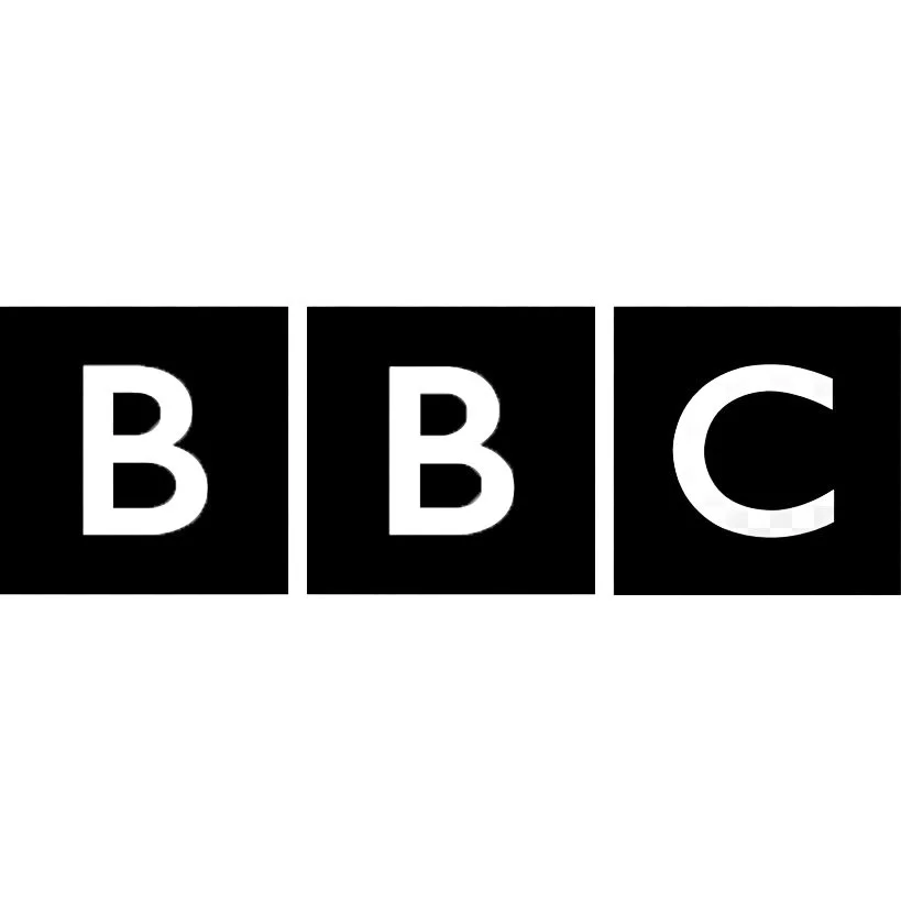 Logo of the BBC, reflecting broadcast media appearances and visual storytelling by Scott Ramsey.