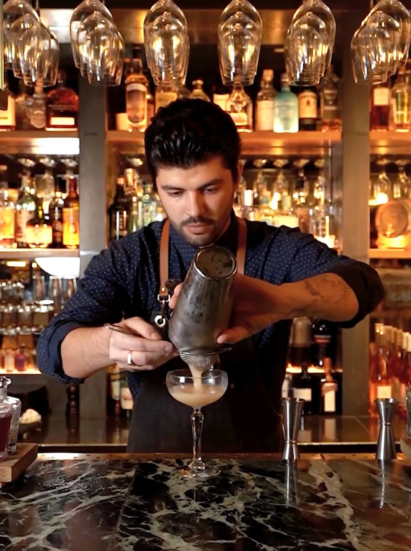 Cinematic close-up of a premium cocktail at Coal Shed London, shot by a social media videographer to demonstrate high-end, 4K vertical content for the hospitality and luxury retail sectors.
