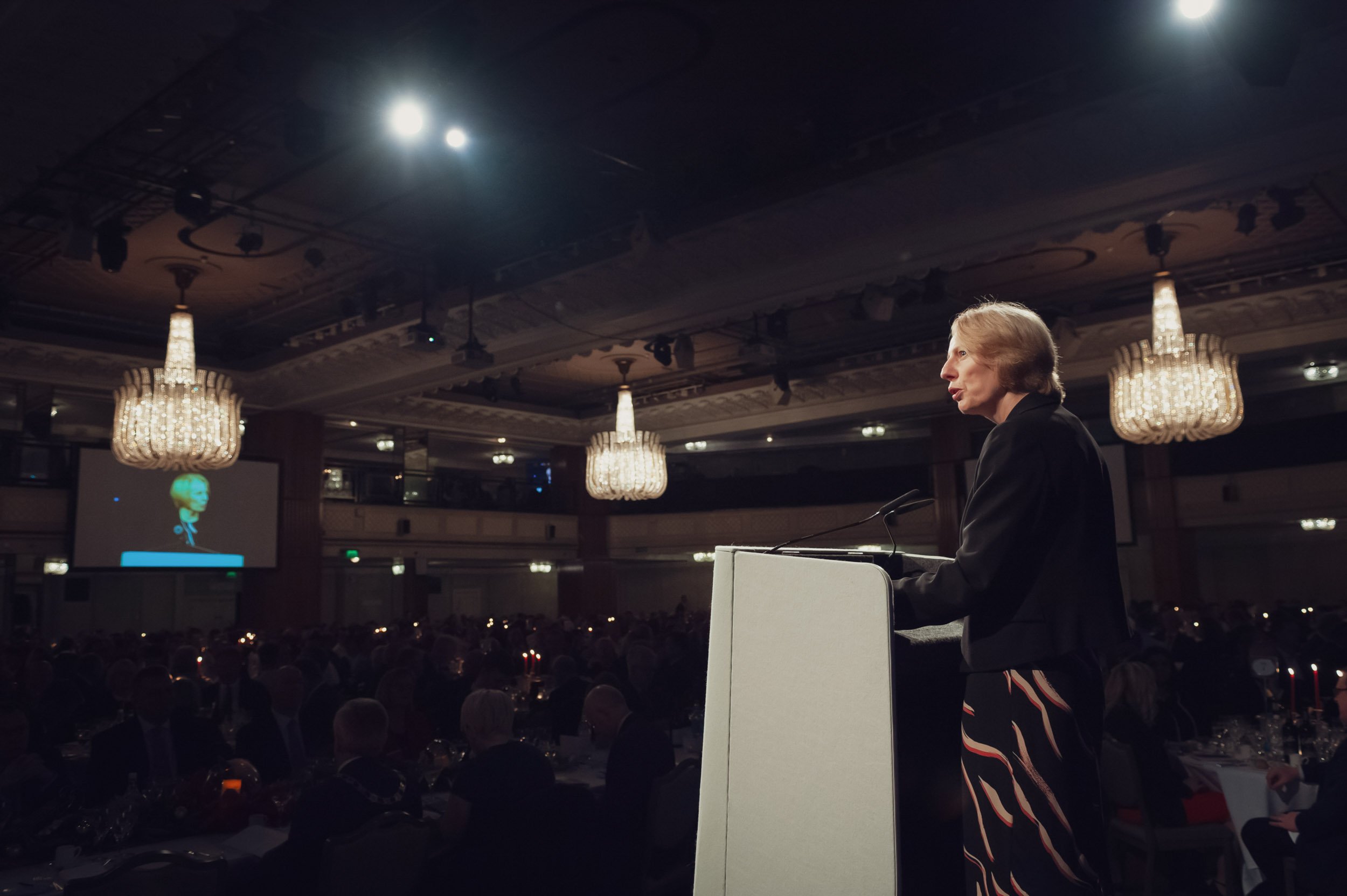 A keynote speaker addressing a corporate audience in the Great Room at Grosvenor House Hotel, Mayfair. Professional London event photography captured by the Scott Ramsey Photography & Videography team.