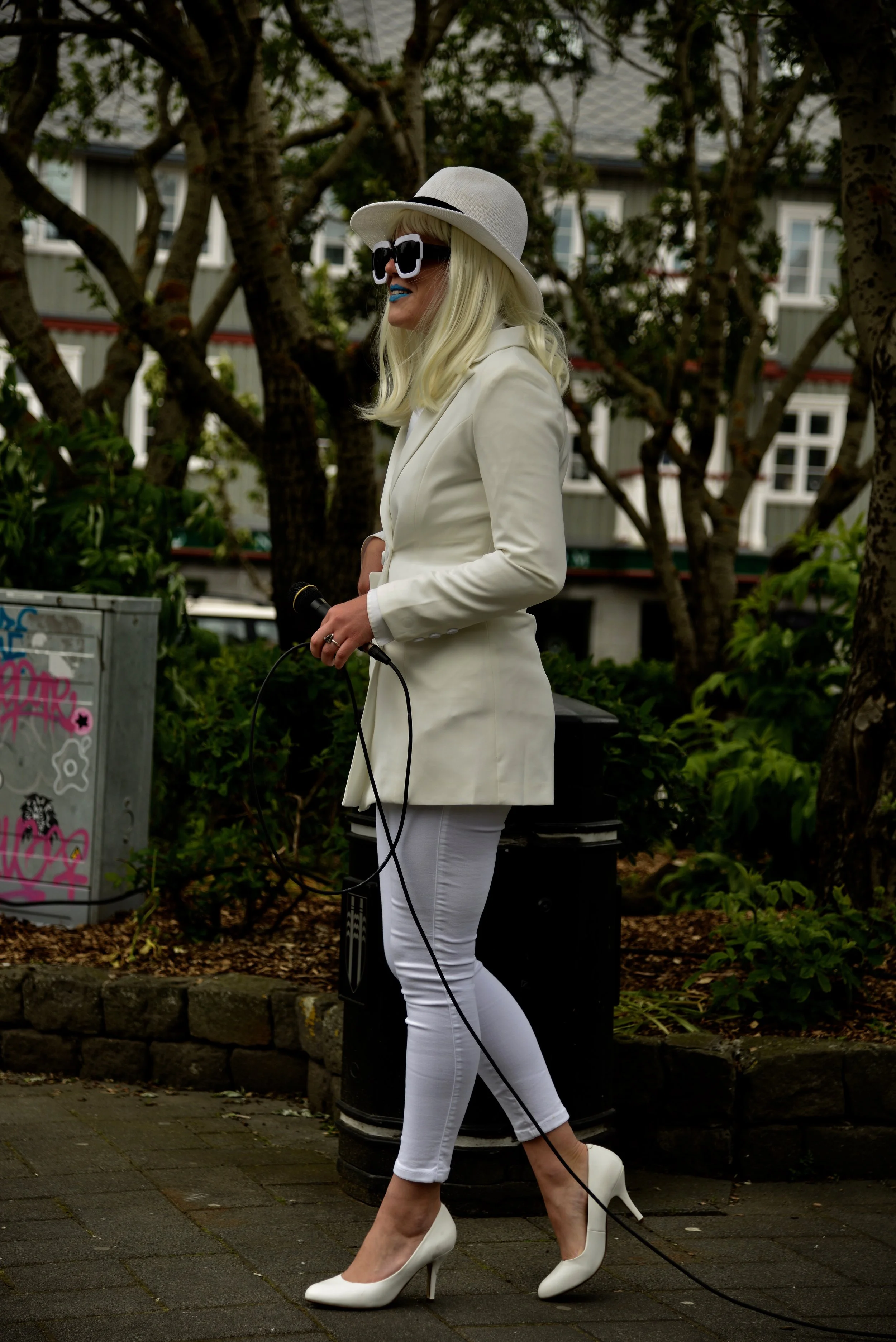 Erin Honeycutt, as "The Chronicler".