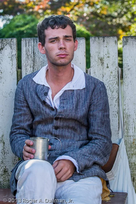 "Indentured servant", taking a break from making barrels.