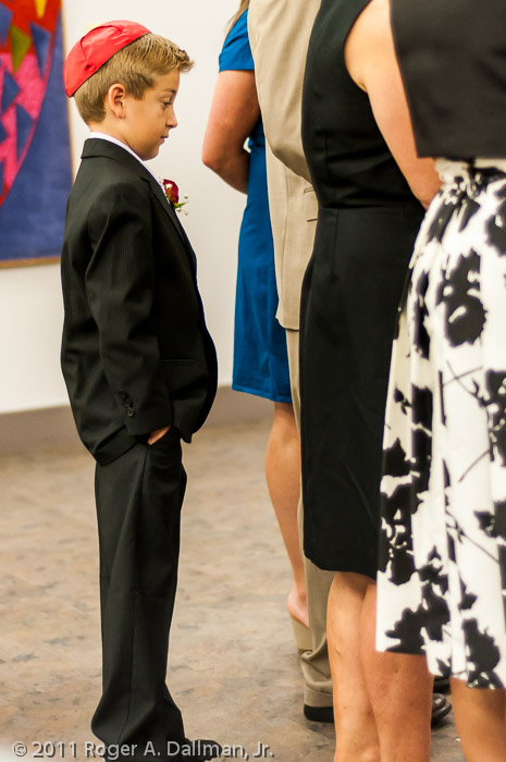 He's not sure why everyone is so excited about this wedding ceremony.