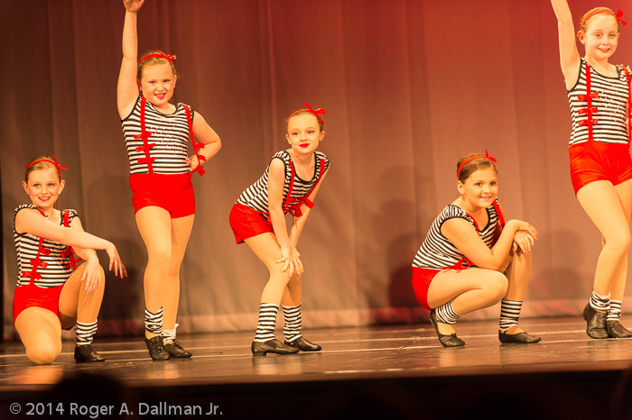 The original photo - too many dancers, on a slanted stage.