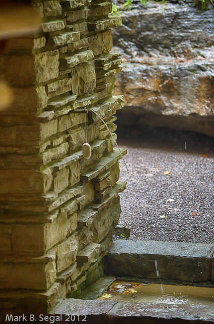 The entryway fountain with soap on a rope for the guests