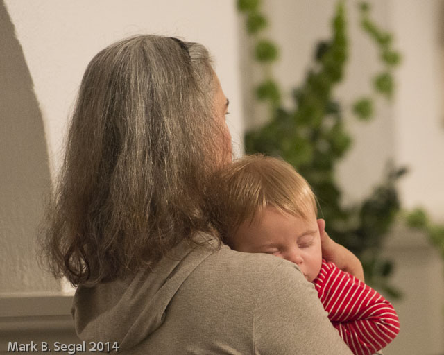 Aperture priority to make the background soft as this baby enjoyed the Christmas concert