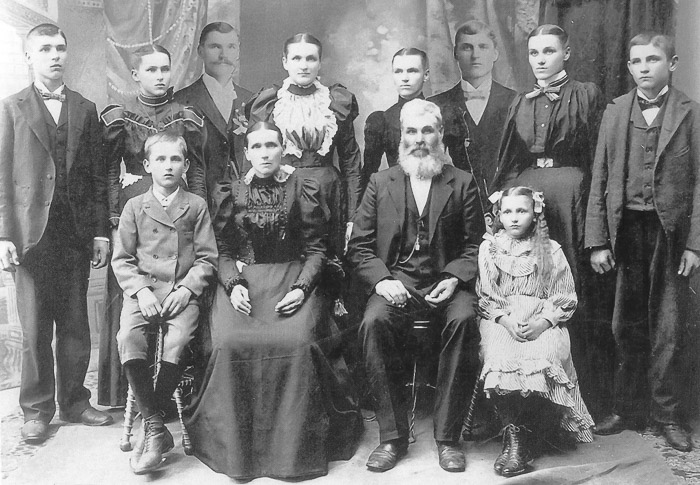 1890s family portrait. Don't let them disappear.