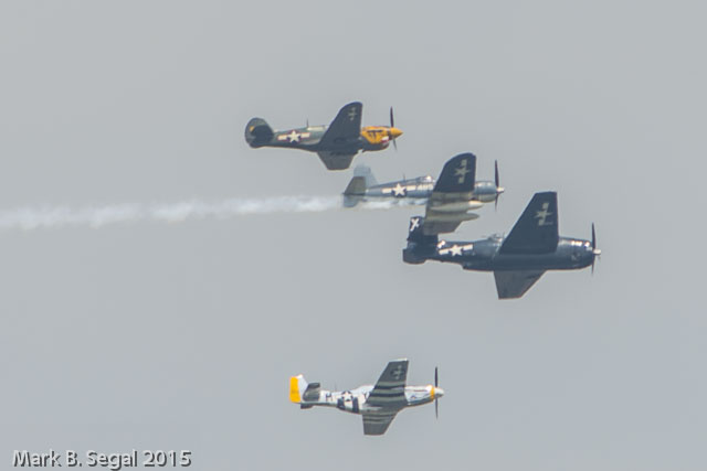 Start of the "Missing Man" finale formation. P-40, Corsair, Avenger, and a Mustang