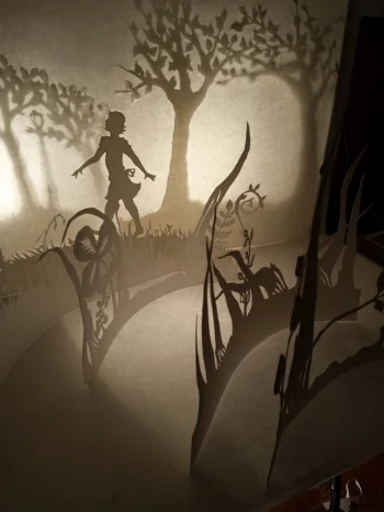 Lizbeth Lou Got a Rock in Her Shoe , words by Troy Howell, paper cut art by Kathryn Carr