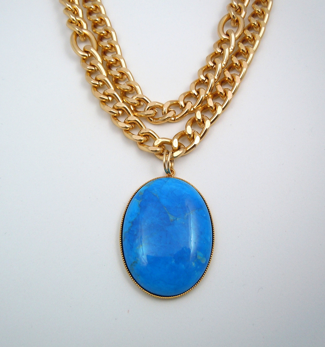 Dyed turquoise blue howlite pendant