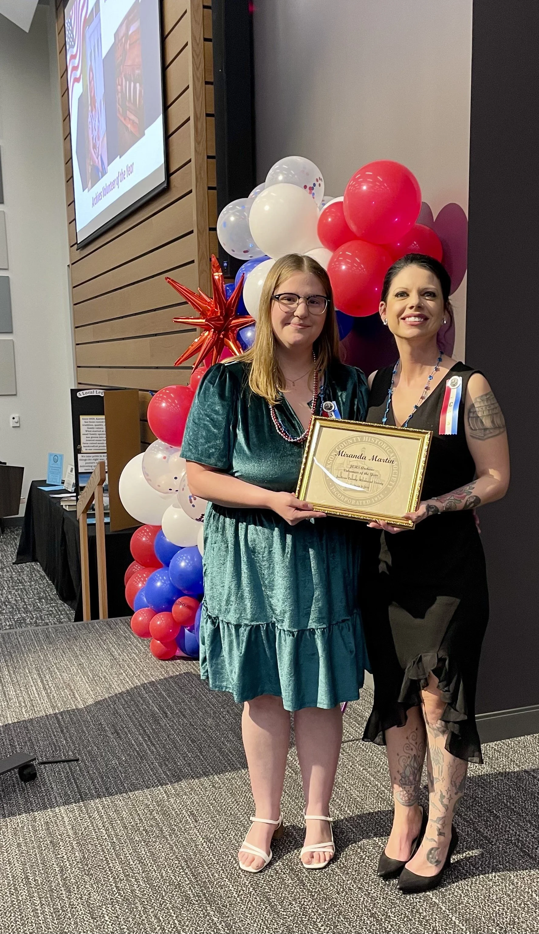 Archives Volunteer of the Year Award Winner. Award Winner (left) Miranda Martin. Archives Director (right) Erin Gray.