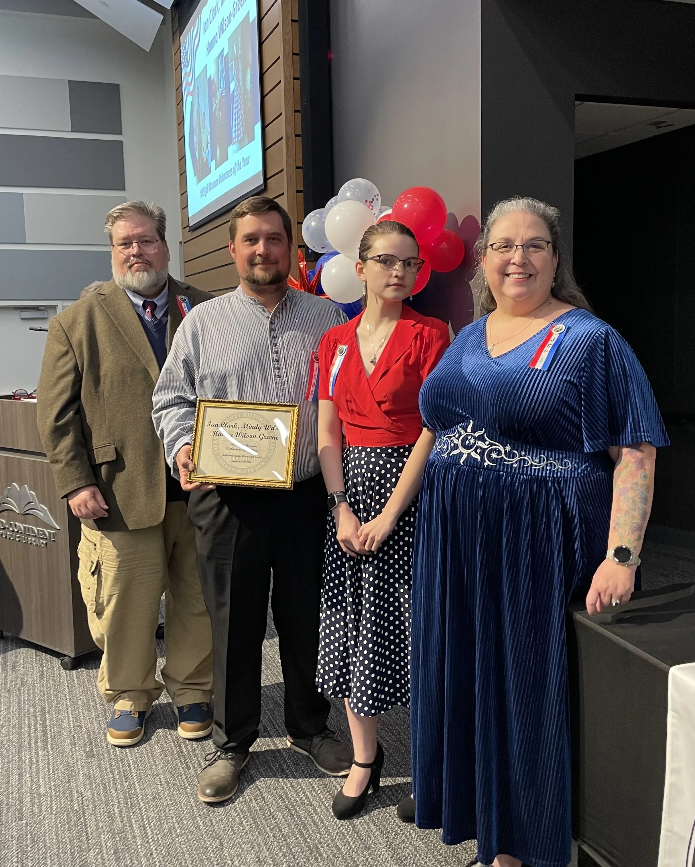 Jail Volunteers of the Year Award Winners. From left - Jason Wade, Site Administrator; Award Winners - Ian Clark, Hanna Wilson-Greene, Mindy Wilson