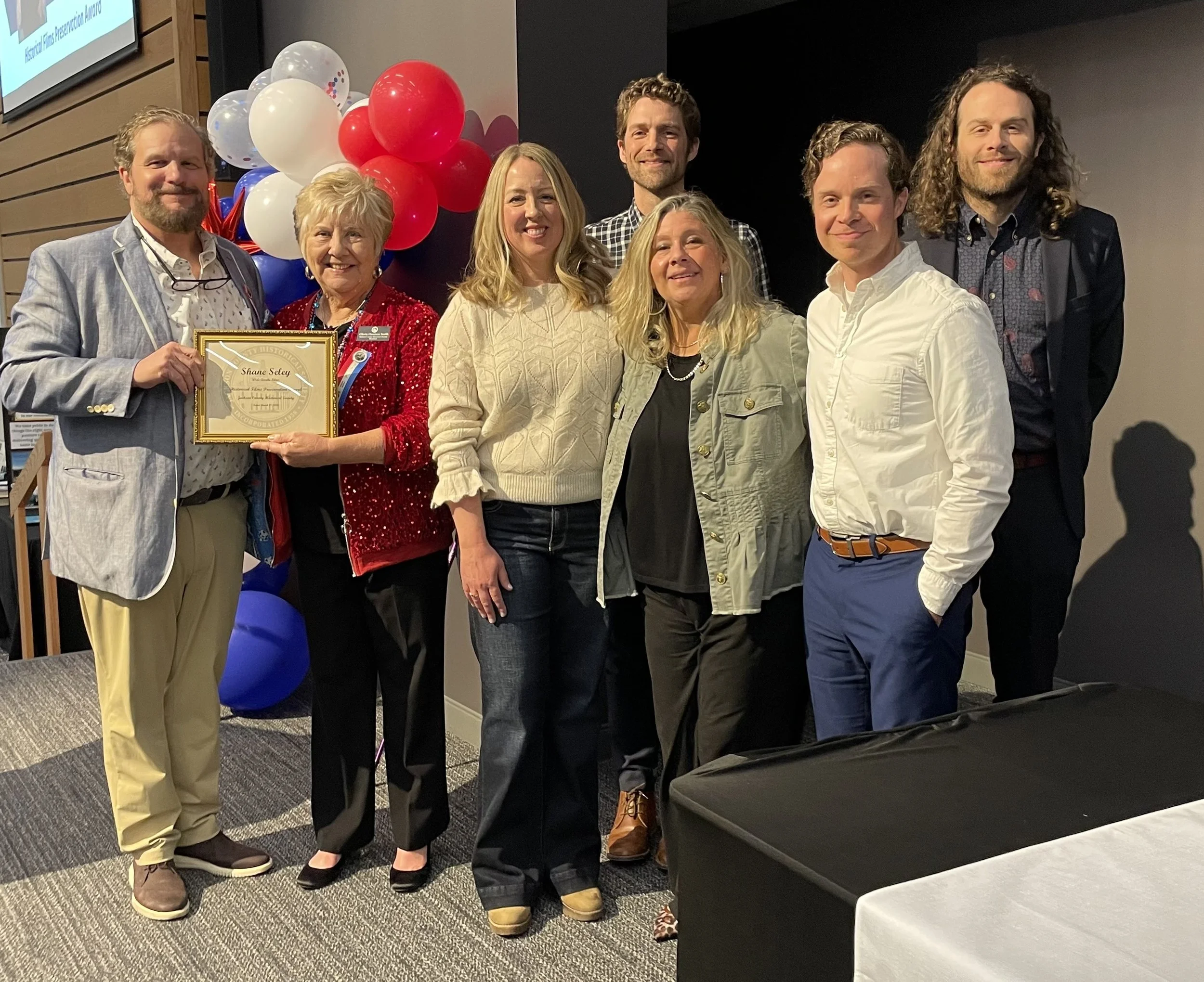Winner of the Historic Films Preservation award - Shane Seley (left) with Gloria Smith and team.