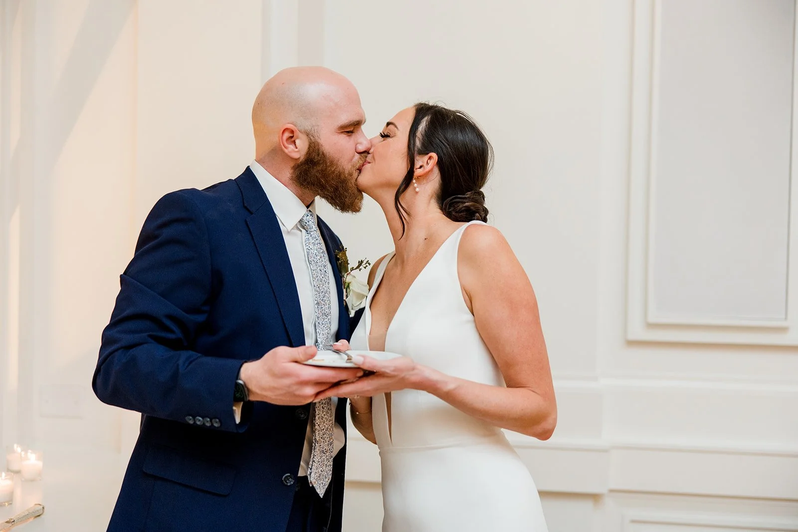 bridal-couple-kissing-at-reception.jpg