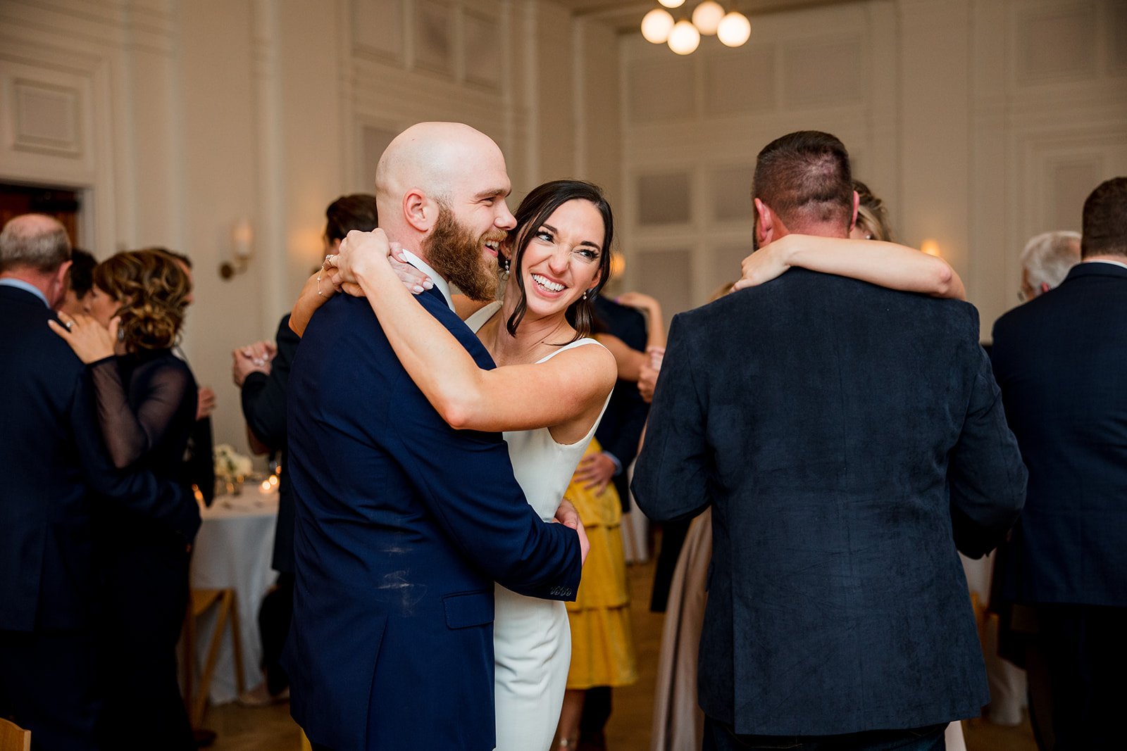 bridal-couple-laughing-and-dancing.jpg