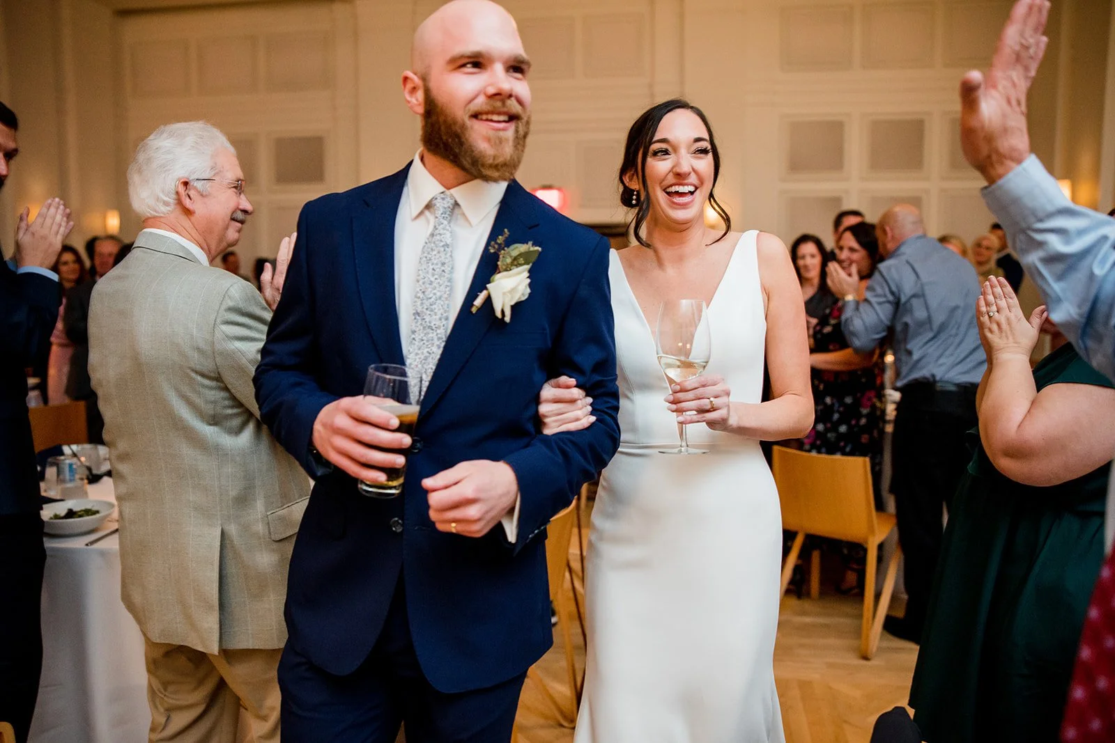 bridal-couple-laughing-at-reception.jpg
