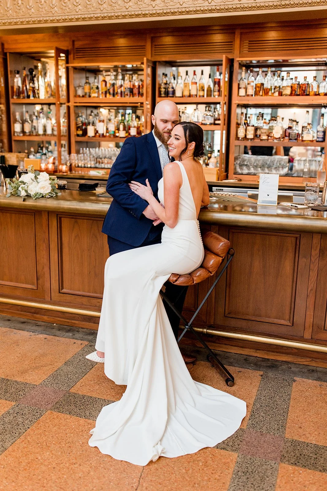 bridal-couple-sitting-at-bar.jpg