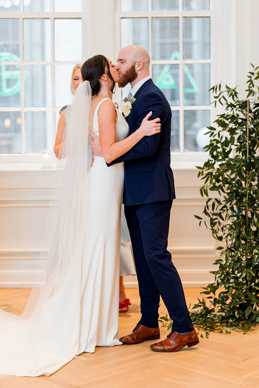 bride-and-groom-first-kiss-at-ceremony.jpg