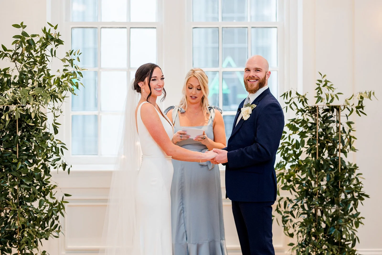 bride-and-groom-smiling-at-guests.jpg