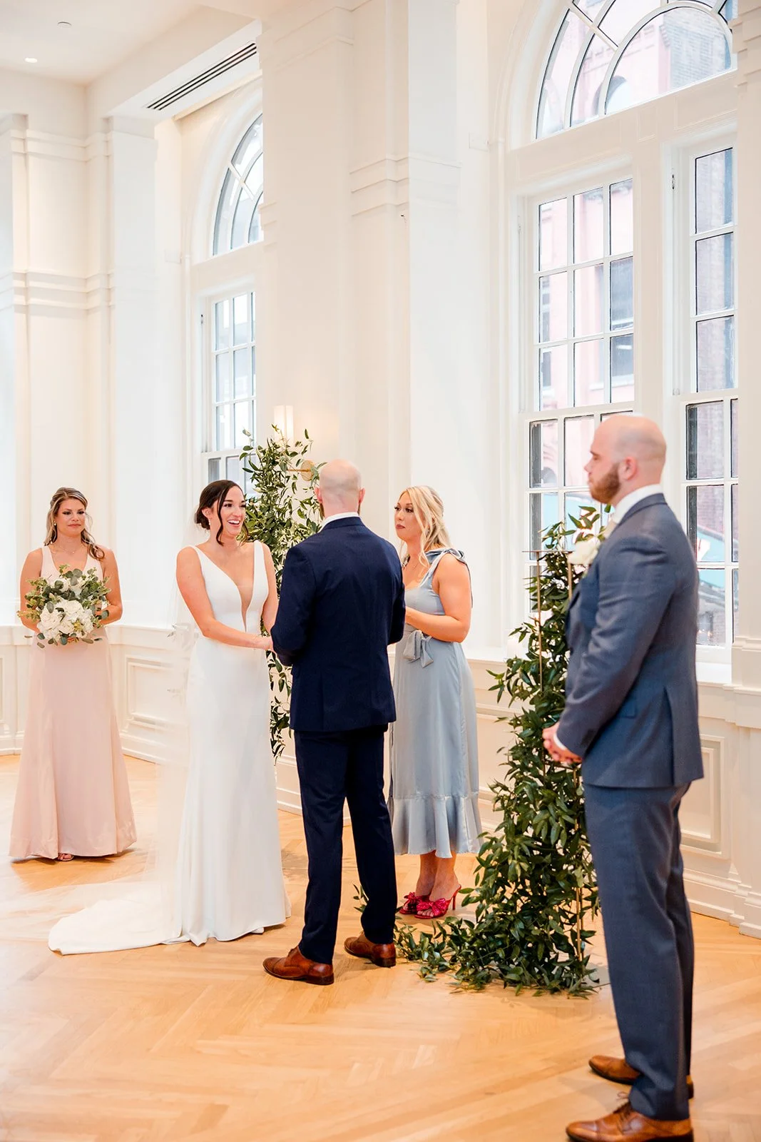 bride-smiling-during-wedding-ceremony.jpg