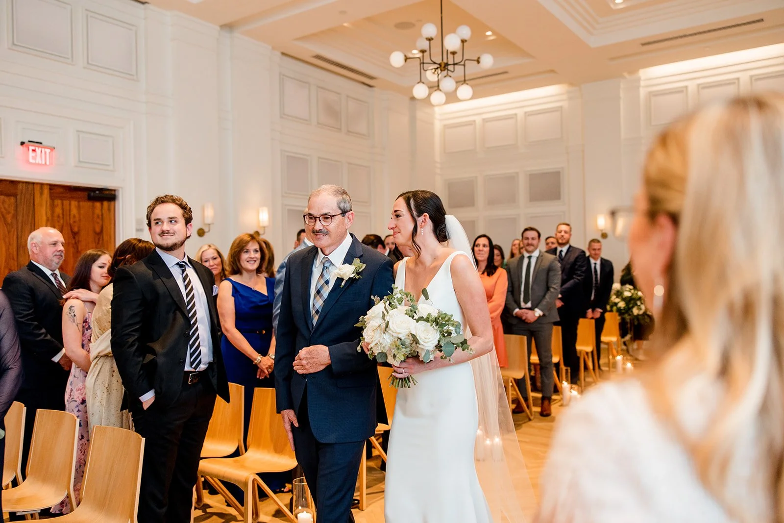 bride-smiling-at-wedding-guests.jpg