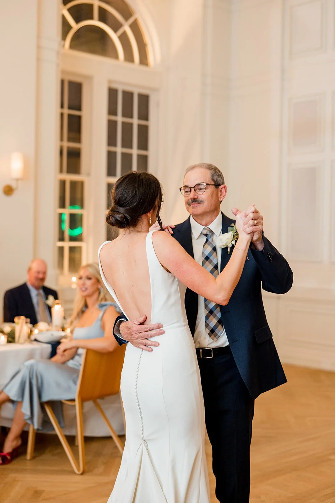 brides-father-smiling-at-bride.jpg