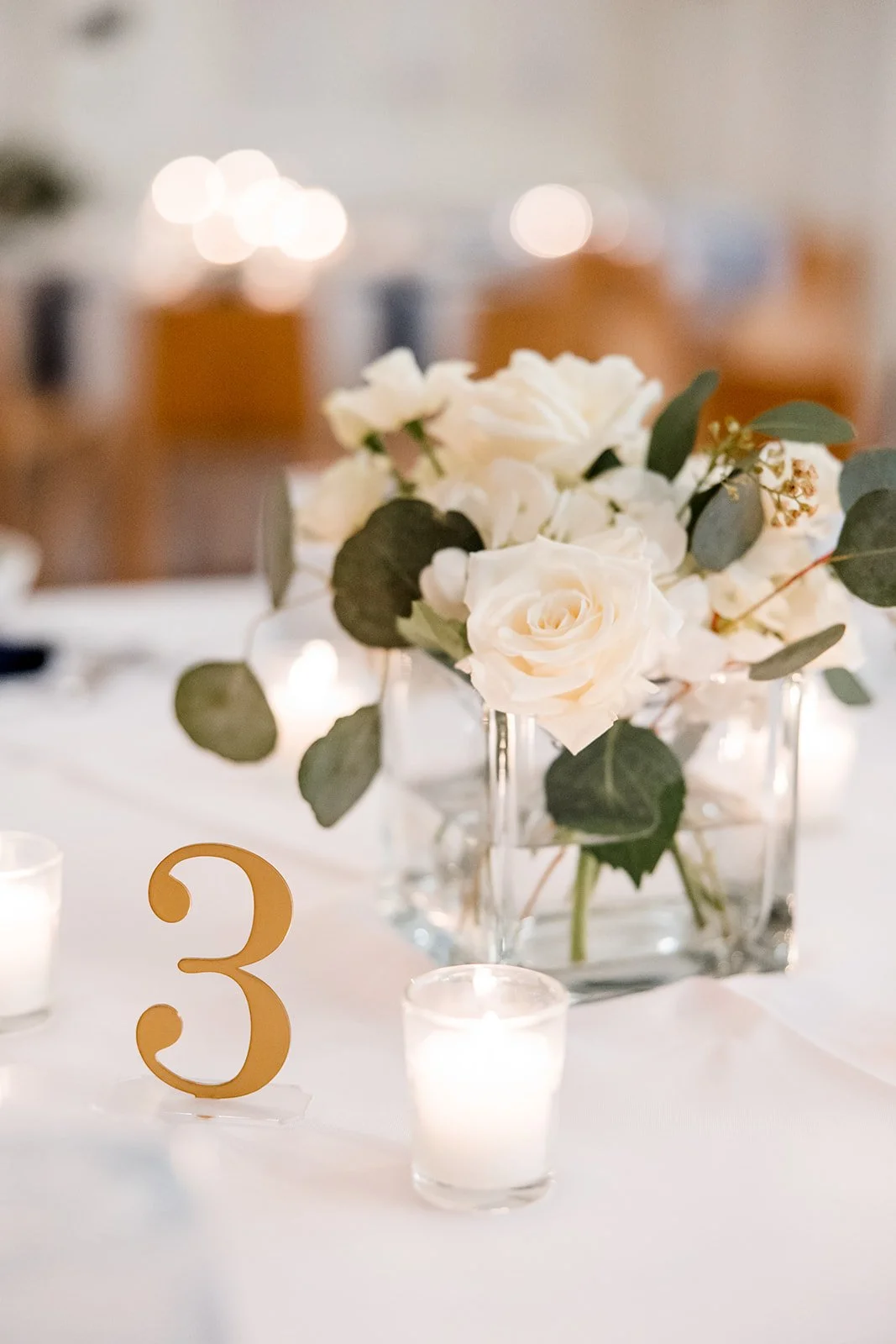 gold-table-number-and-rose-arrangement.jpg