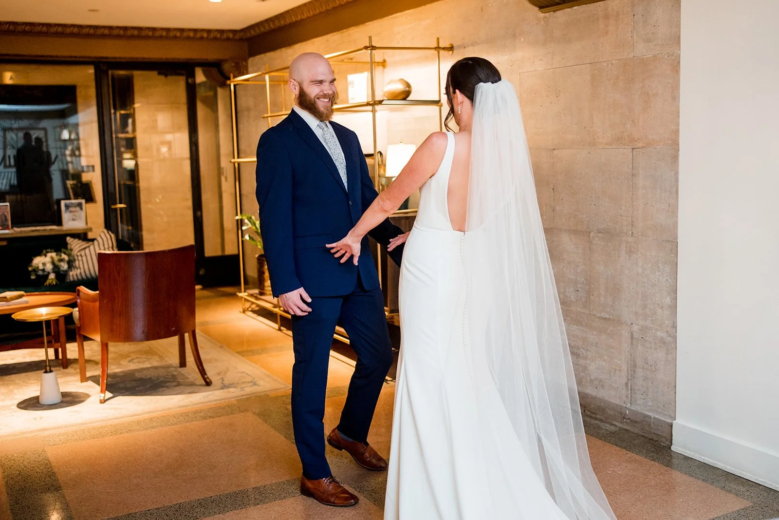 groom-sees-bride-at-first-look.jpg