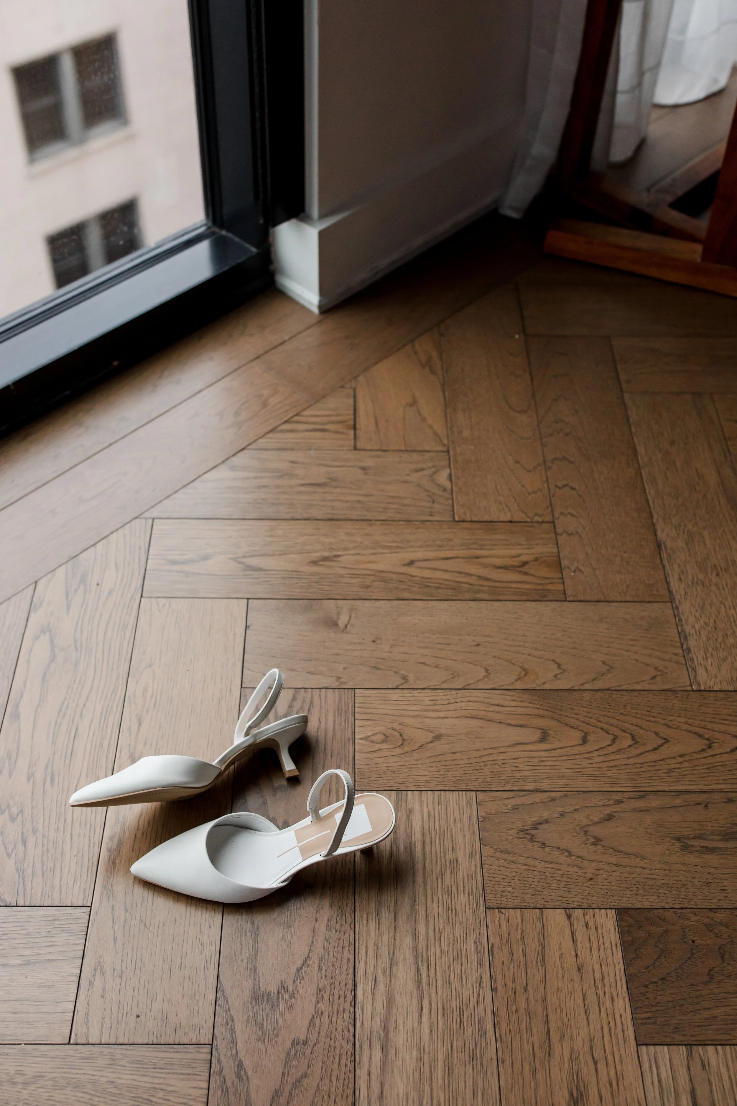 bridal-shoes-on-hardwood-floor.jpg