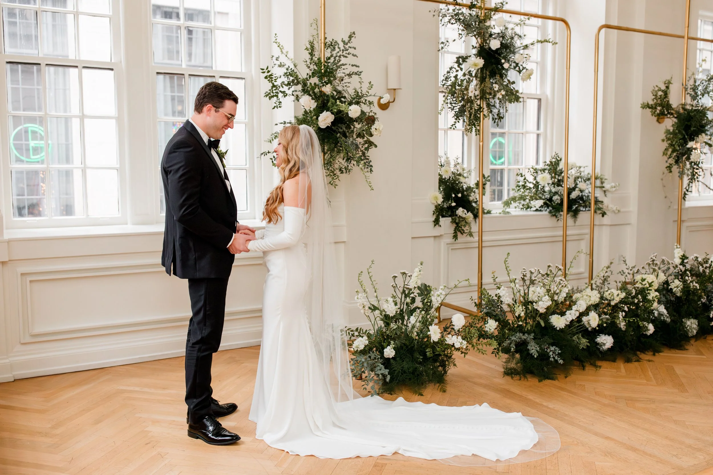 bride-and-groom-smiling-first-look.jpg