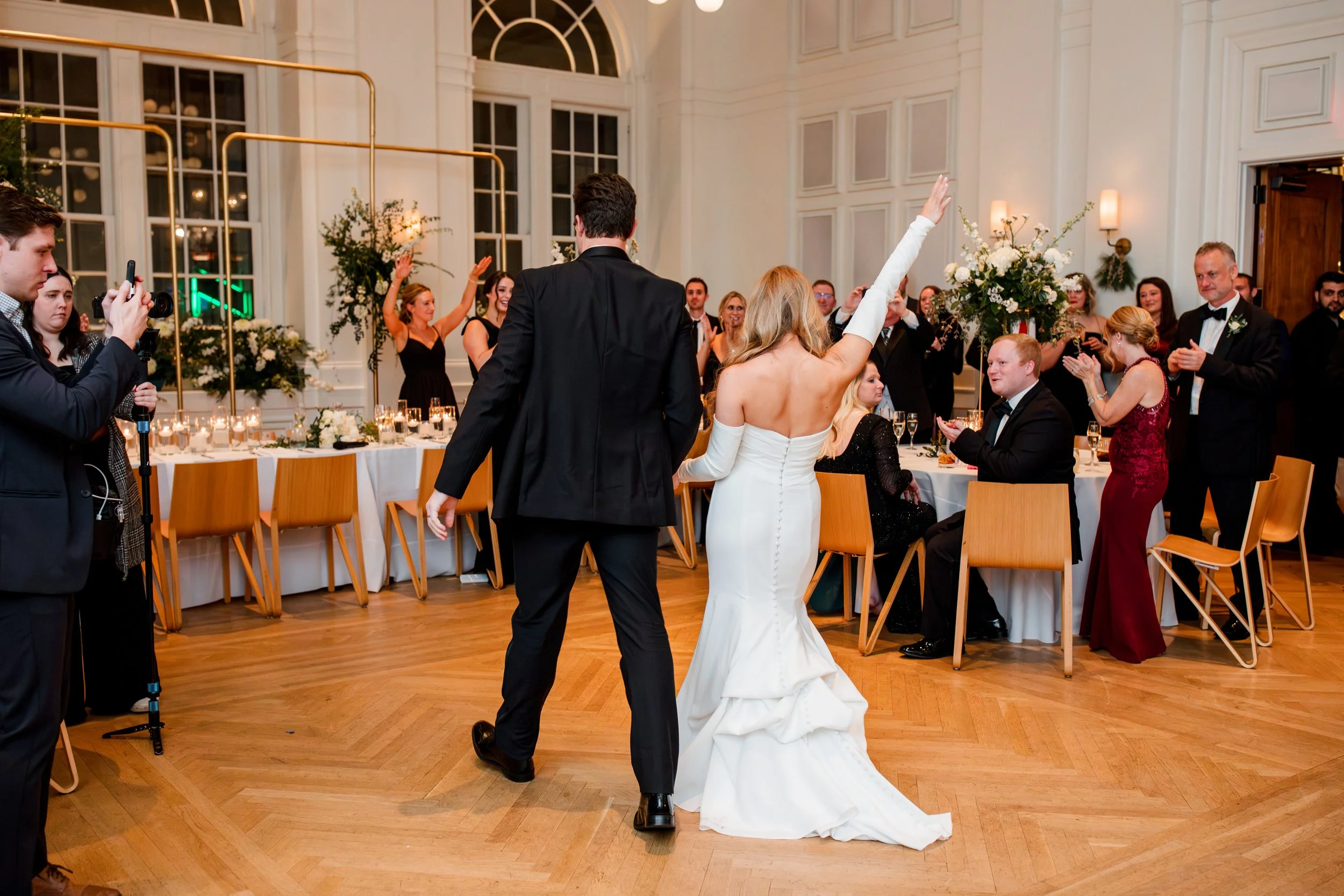 bride-cheering-entering-reception.jpg
