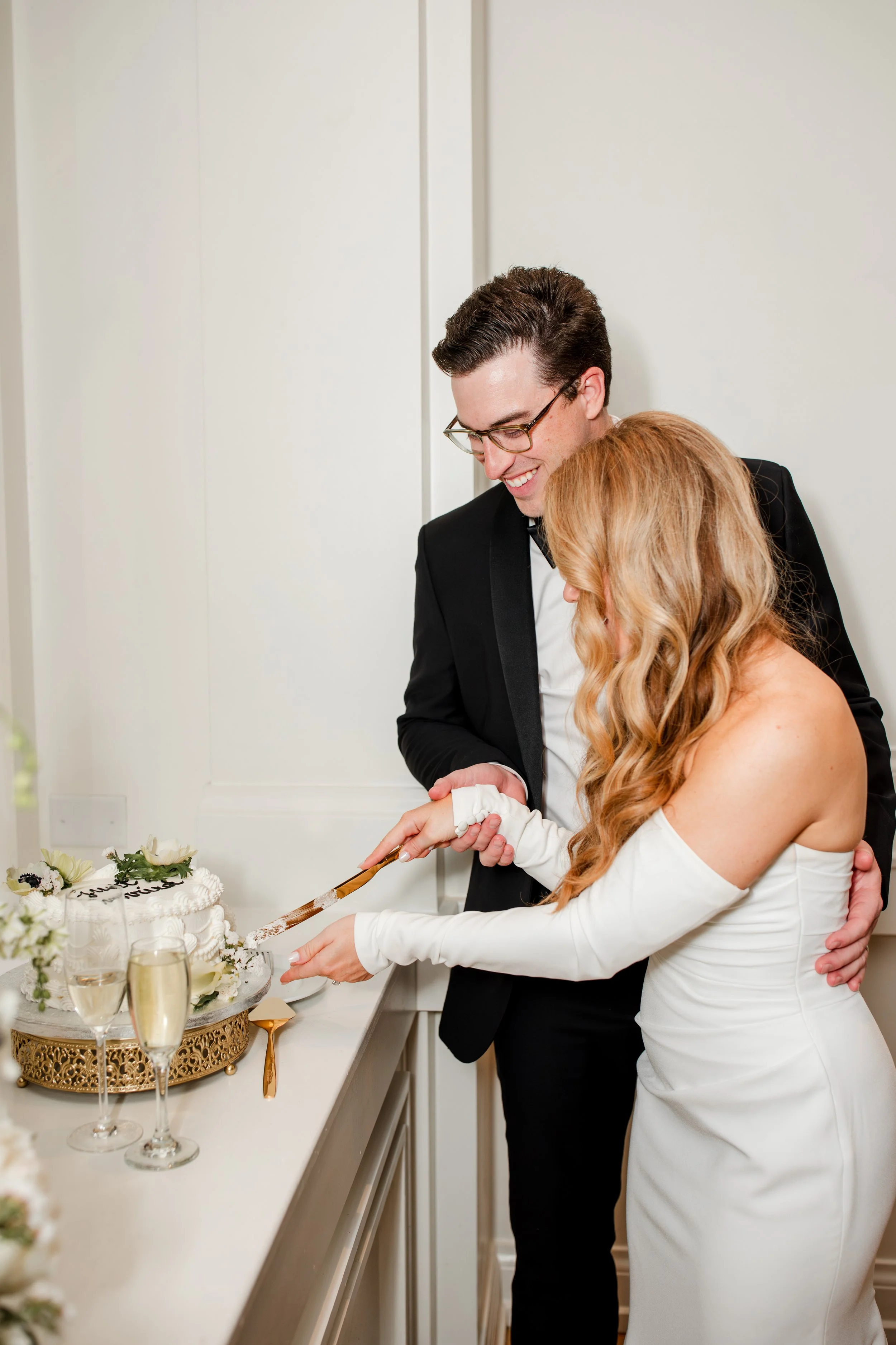 bride-groom-cutting-wedding-cake.jpg