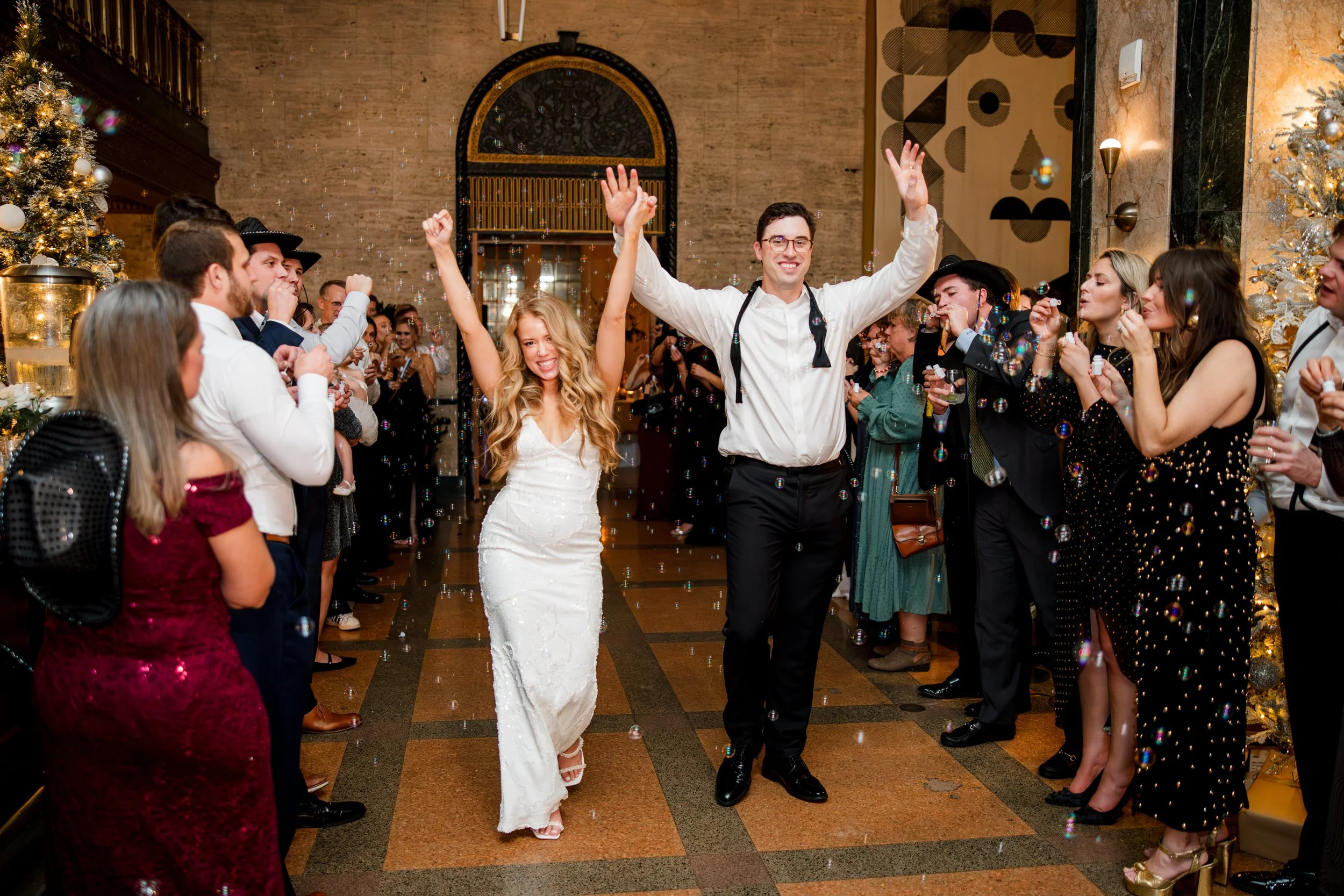 bride-groom-cheer-bubble-reception-exit.jpg