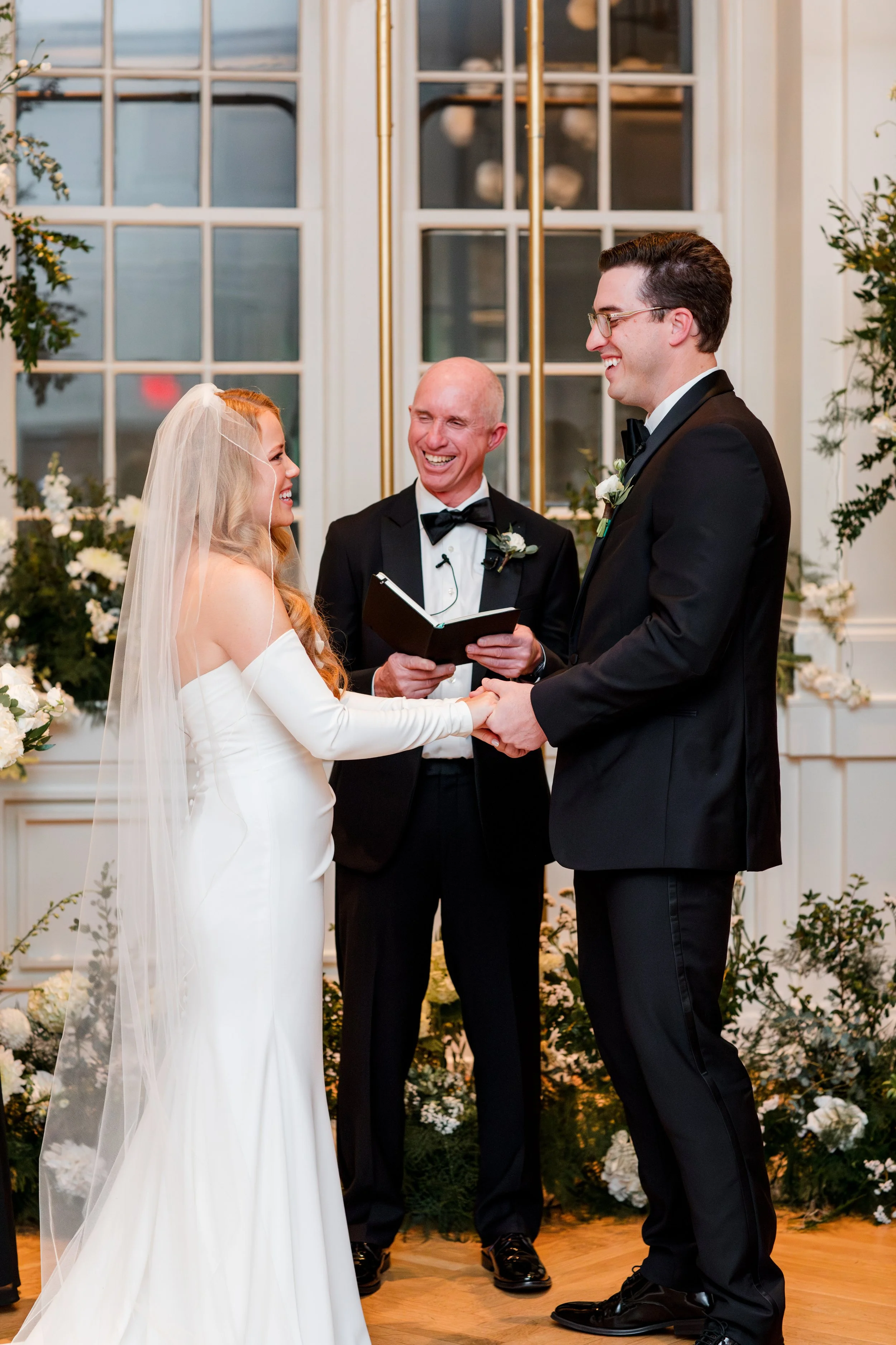 bride-groom-laughing-during-ceremony.jpg