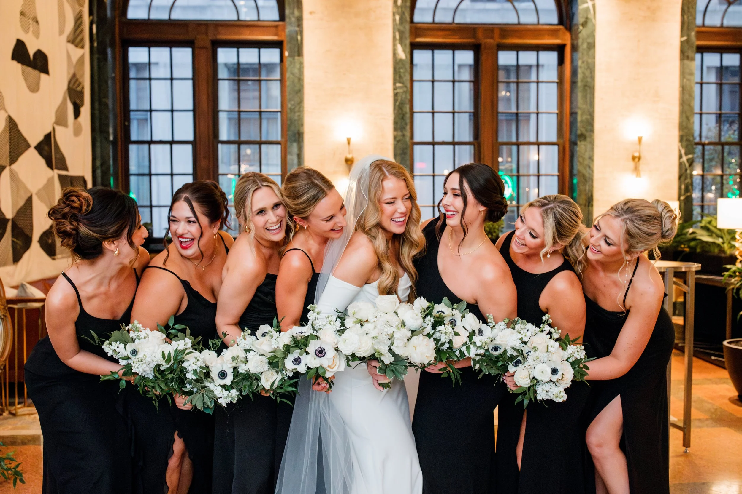 bridesmaids-smiling-with bride.jpg