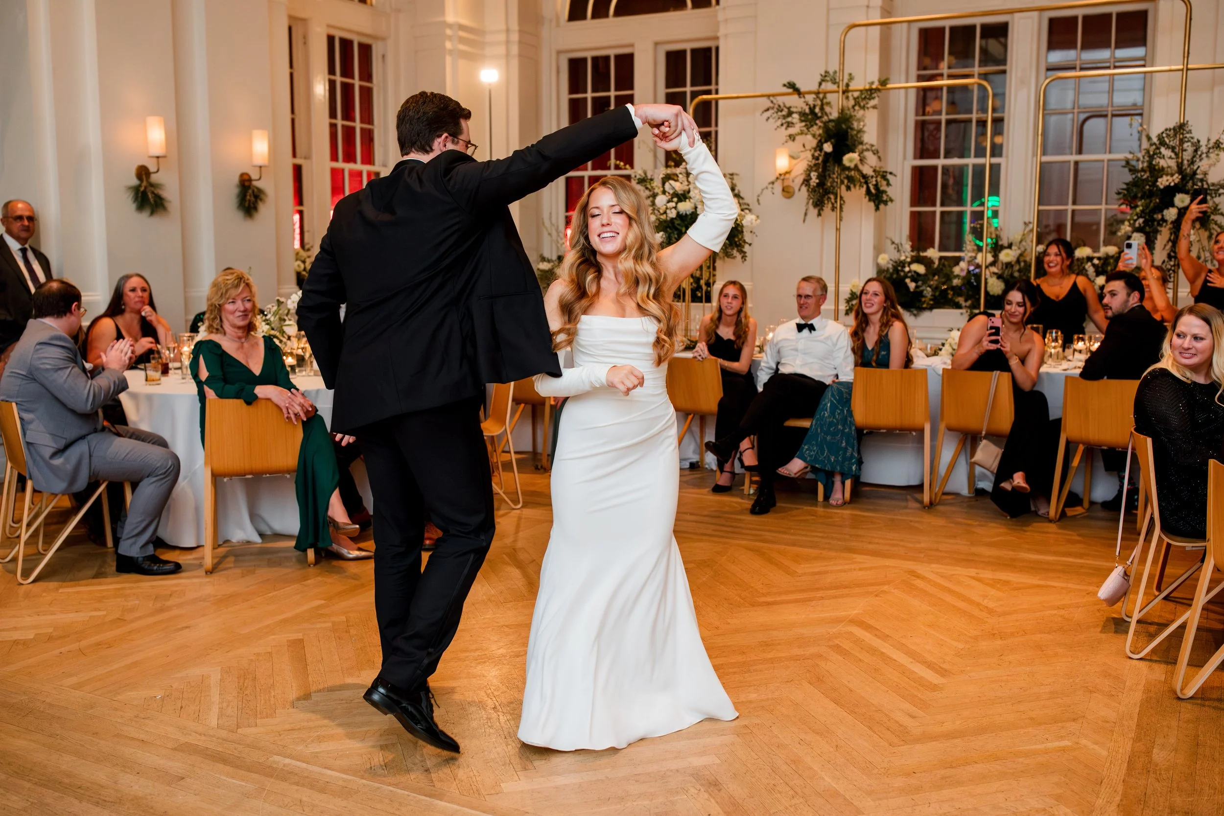 groom-twirling-bride-first-dance.jpg