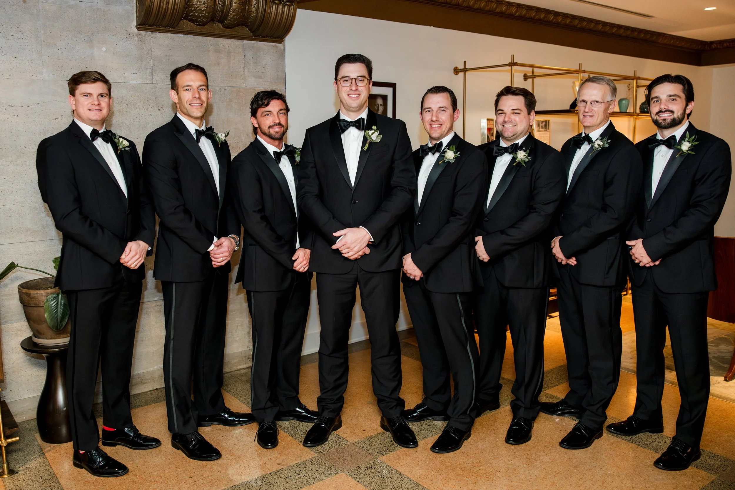 groomsmen-standing-together-smiling.jpg