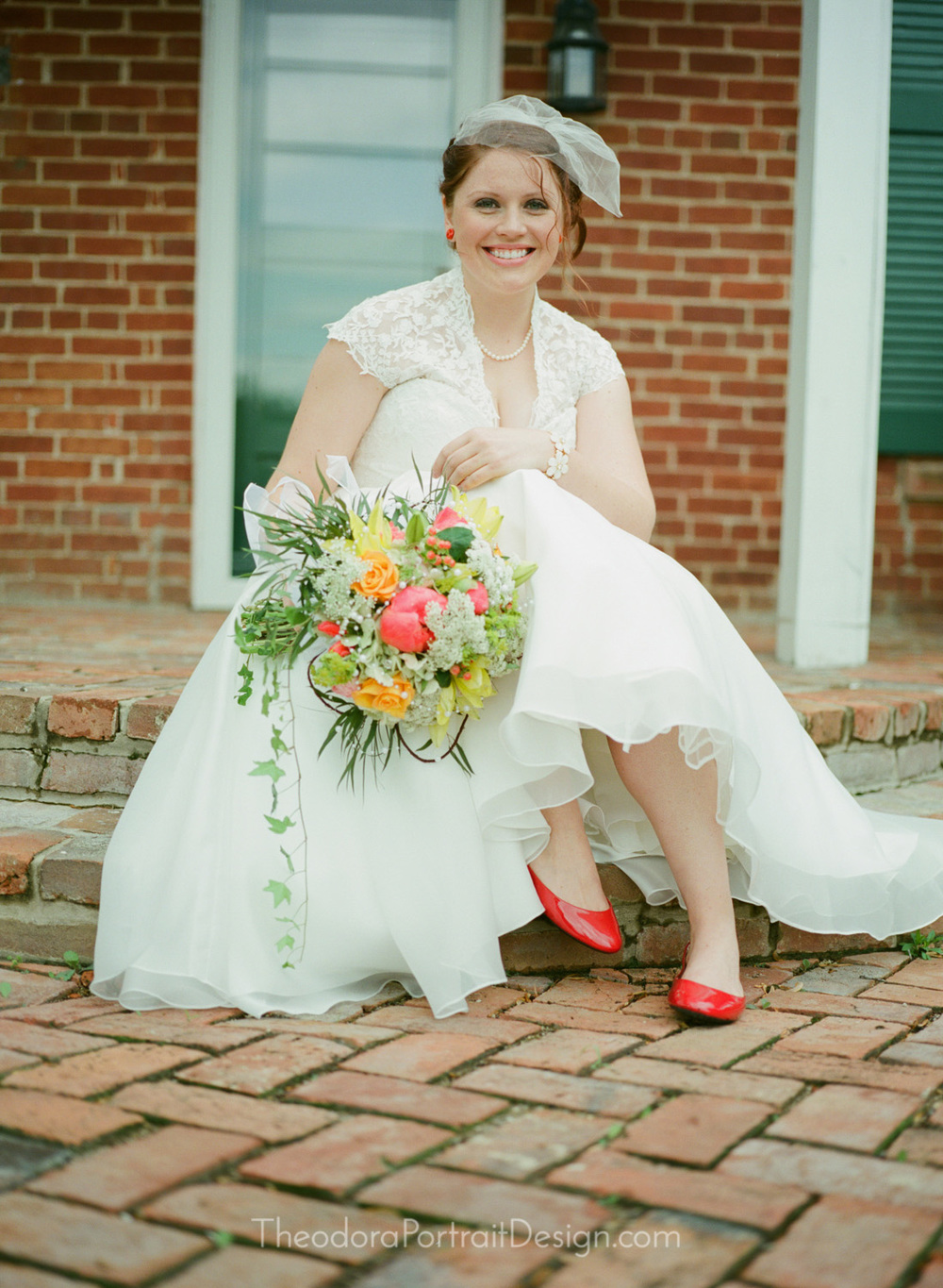  beautiful bride in vintage inspired tea length wedding dress      www.TheodoraPortraitDesign.com   film wedding photography 