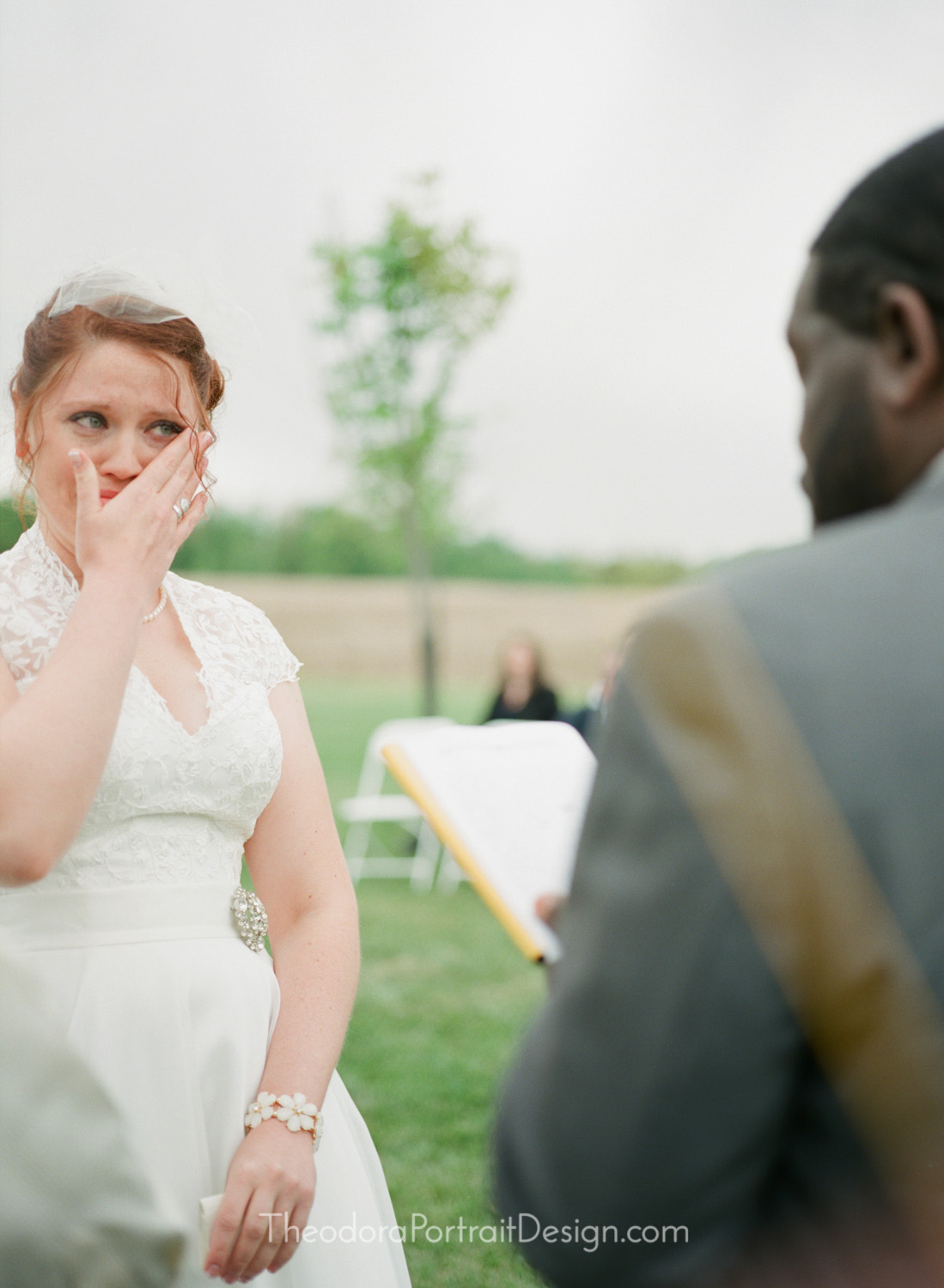  bride and groom exchanging vows&nbsp;   www.TheodoraPortraitDesign.com   film wedding photography 