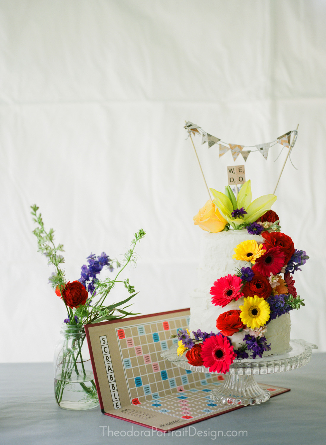  scrabble tile tablescape with wedding cake   www.TheodoraPortraitDesign.com   film wedding photography 