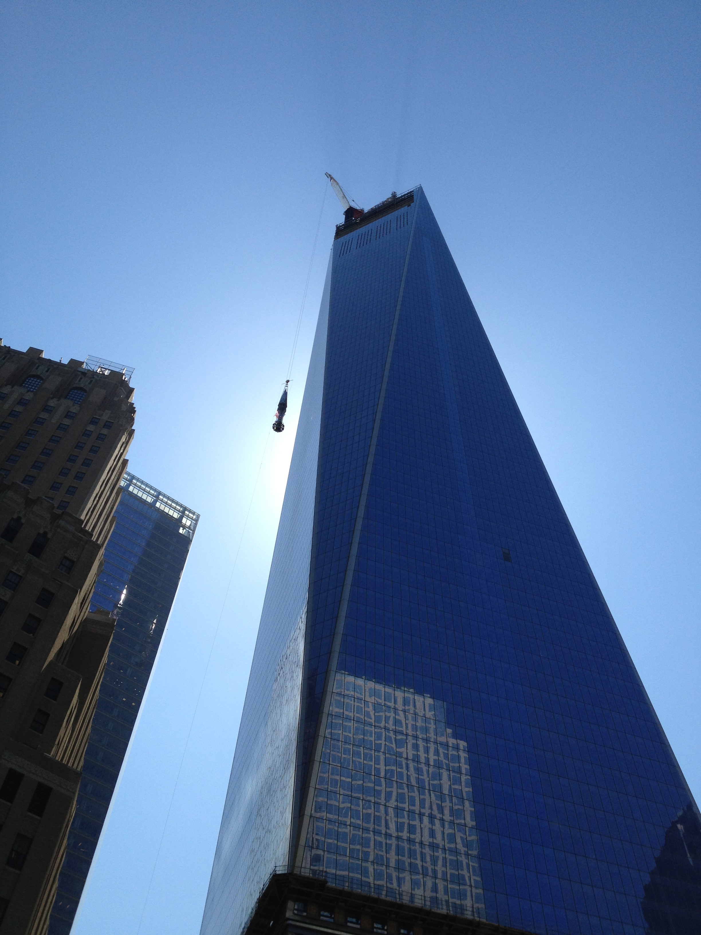 We watched the spire travel to the top of the building.