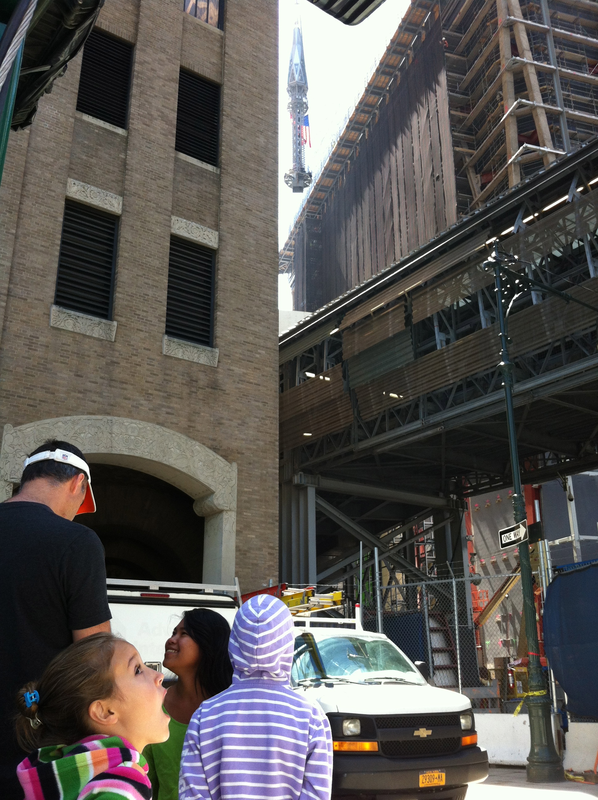 Watching the spire travel to the top of the WTC.