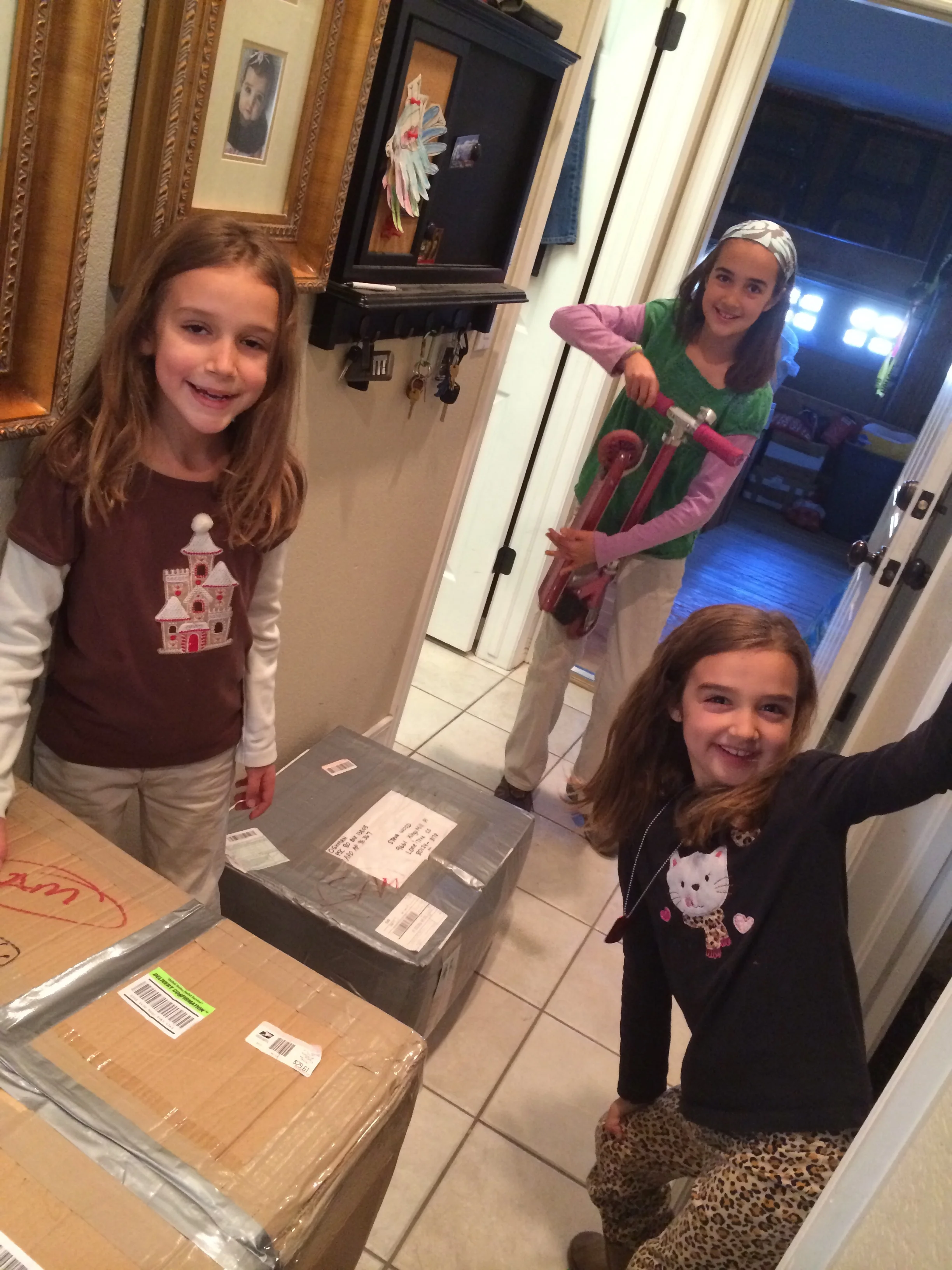 Once all the boxes were packed in my in-laws' basement we lugged them upstairs and into the garage. The girls are actually at a helpful age, which is awesome. 