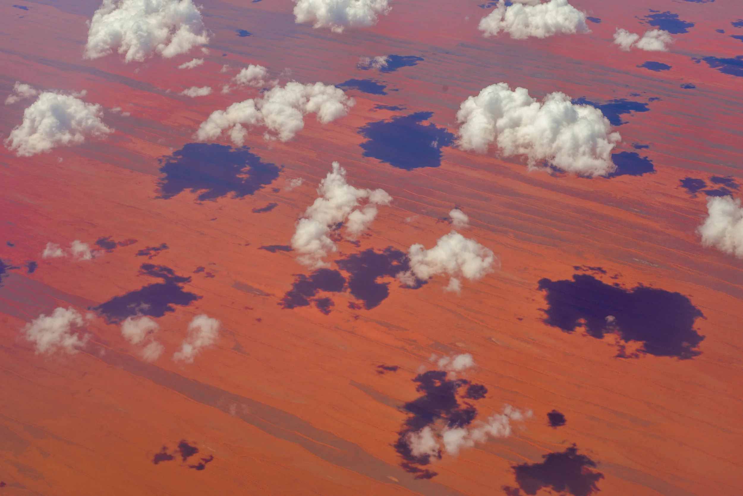Flying over red desert in the middle of Australia