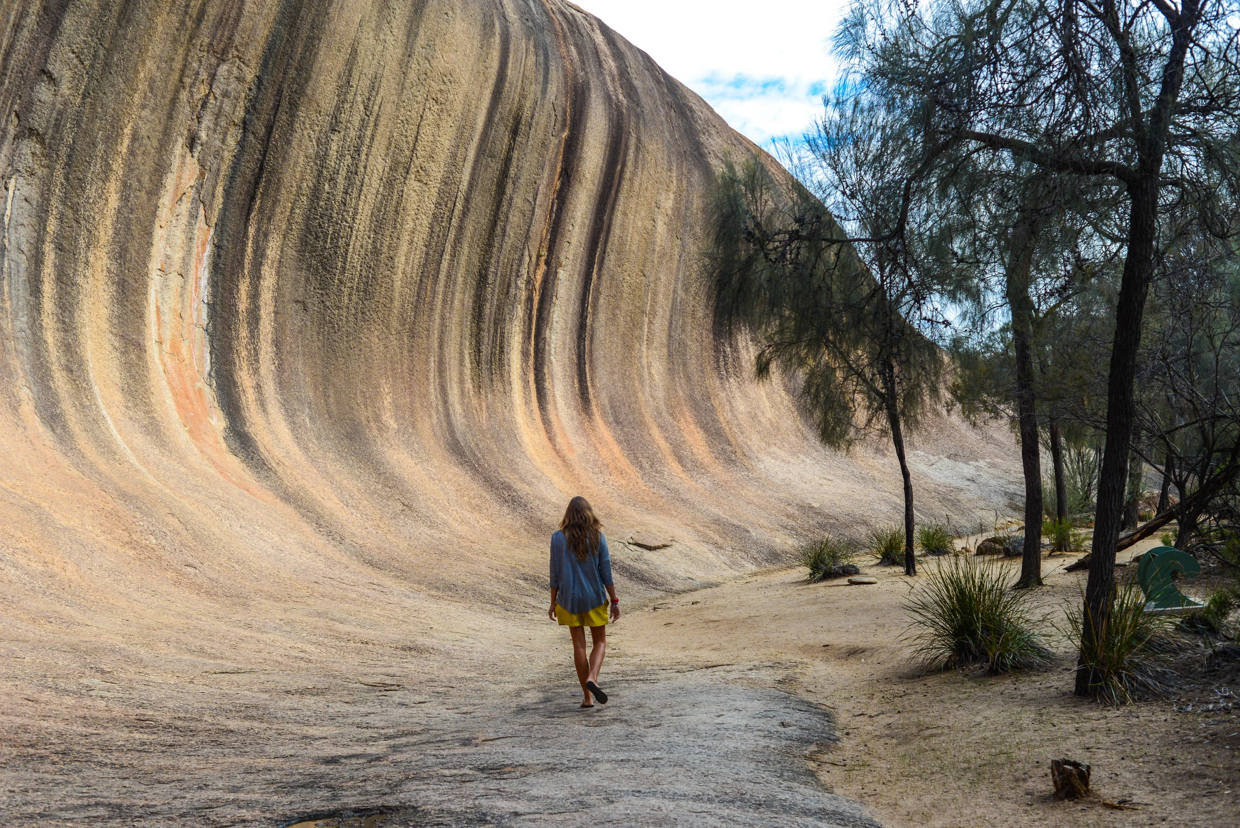 Walking below Wave Rock in Western Australia.