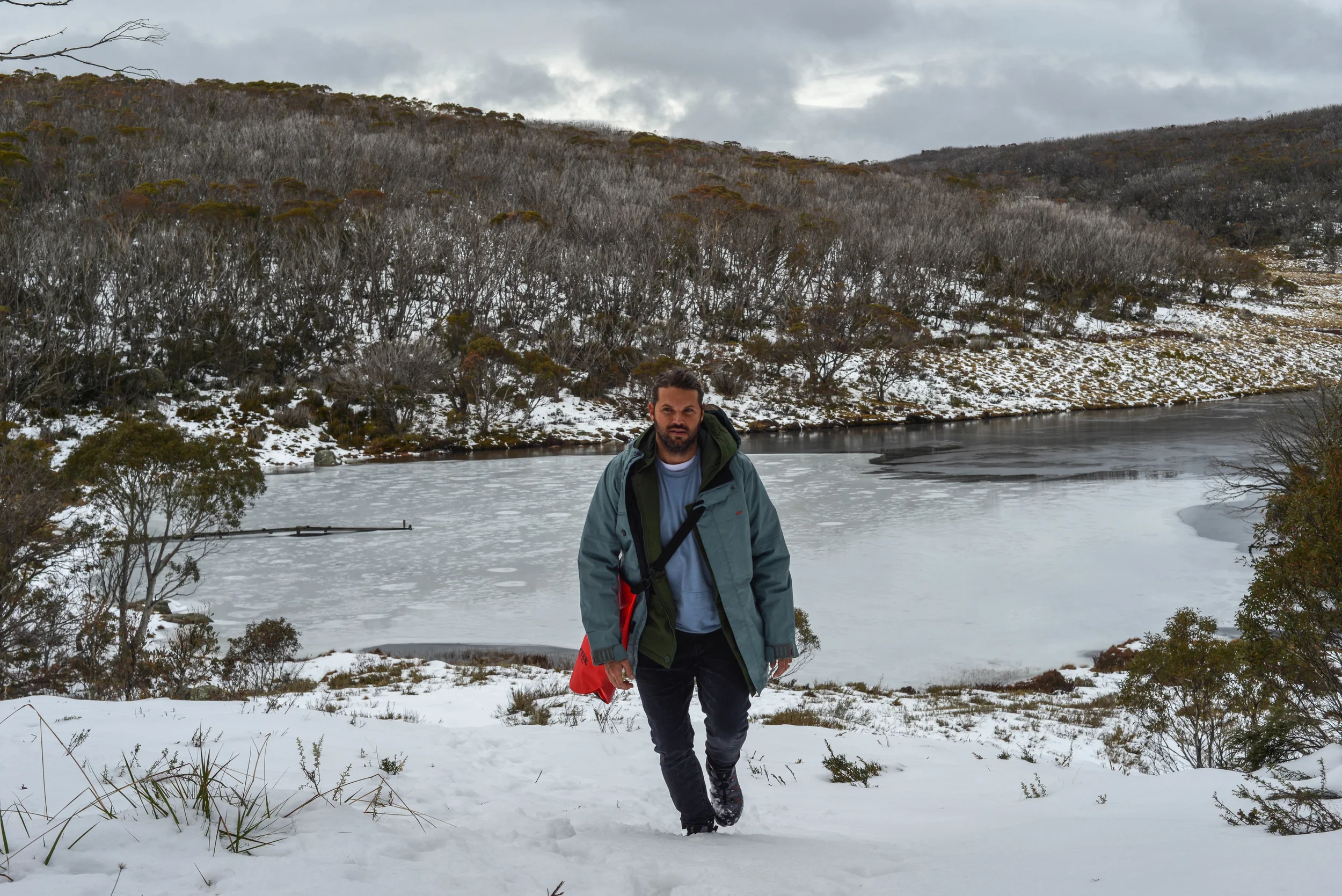 Hiking to Rainbow Lake in Kosciuszko National Park, New South Wales.