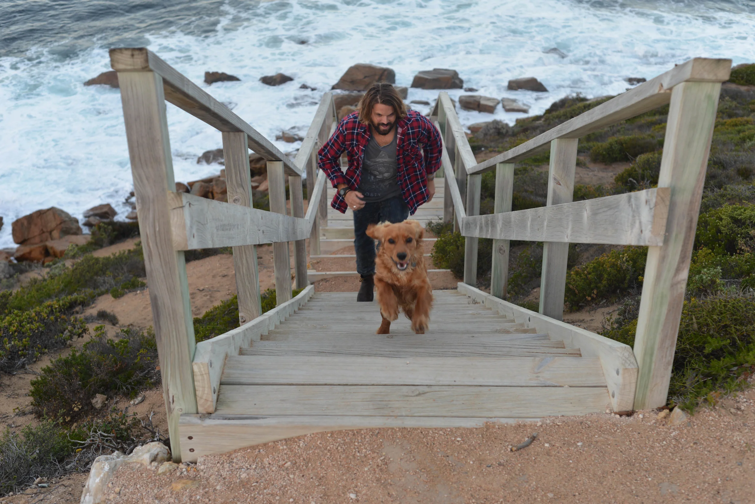 Jonny losing a stair race with our new friend.