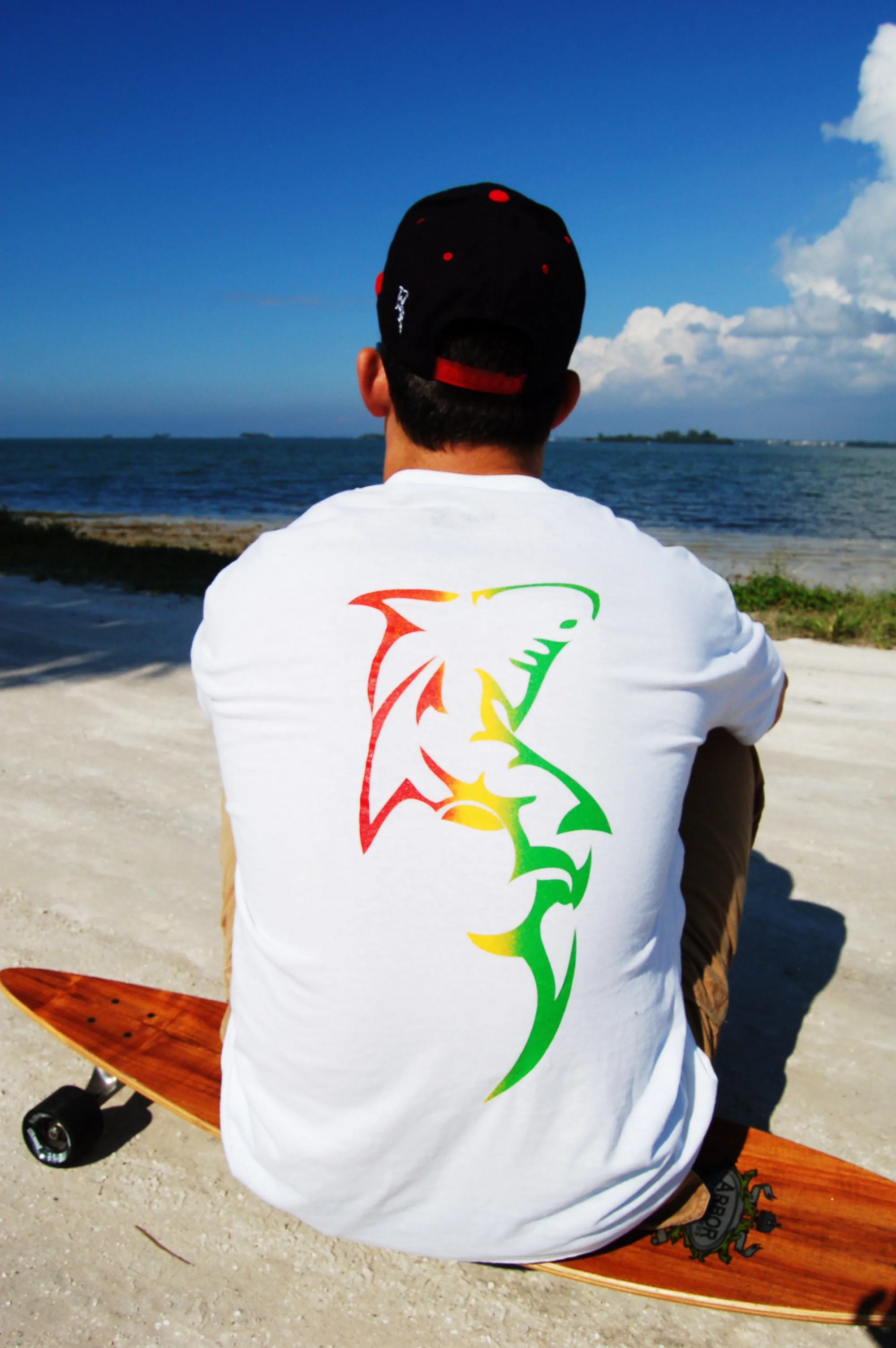 Reggea and hat-longboard.jpg